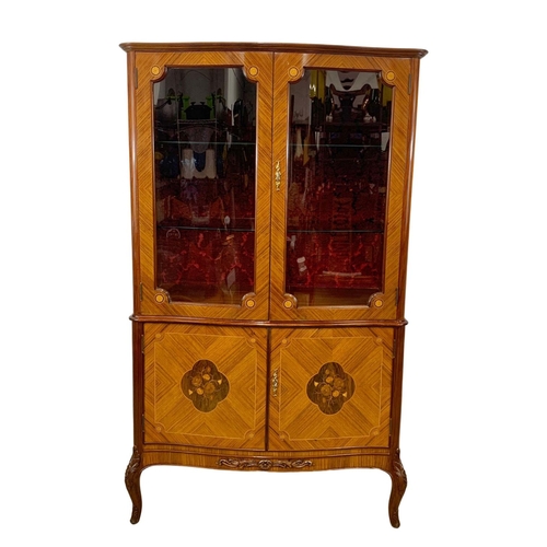 892 - An 18th century style French inlaid display cabinet. 93 x 47 x 152.5cm.