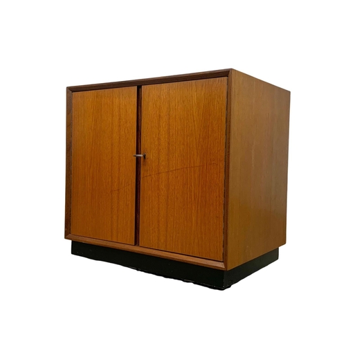 901 - A Mid Century teak record cabinet by Dynatron Radio LTD. 59 x 40.5 x 56cm.