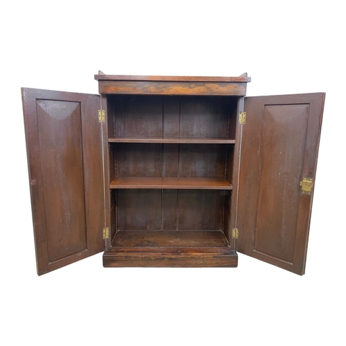 904 - A William IV rosewood side cabinet with gallery back and shelving. Circa 1830’s. 75.5 x 30.5 x 104.5... 