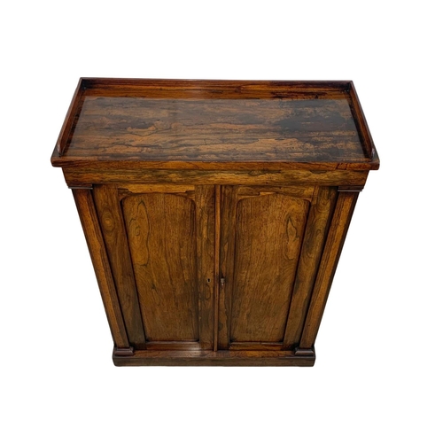 904 - A William IV rosewood side cabinet with gallery back and shelving. Circa 1830’s. 75.5 x 30.5 x 104.5... 