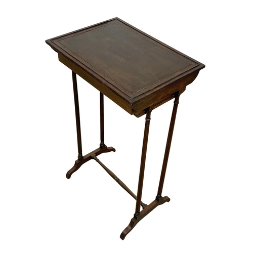 907 - An Edwardian mahogany plant table.