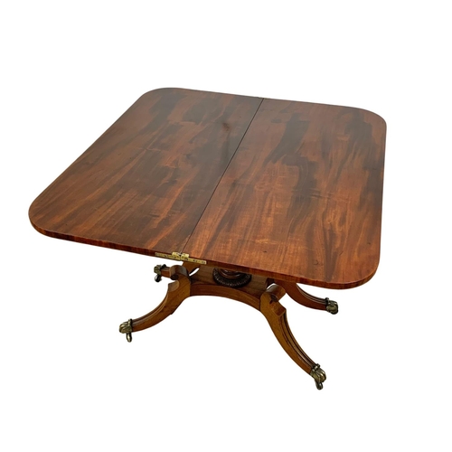 908 - A George IV mahogany turnover tea table. Circa 1820's. 96 x 44.5 x 75.5cm