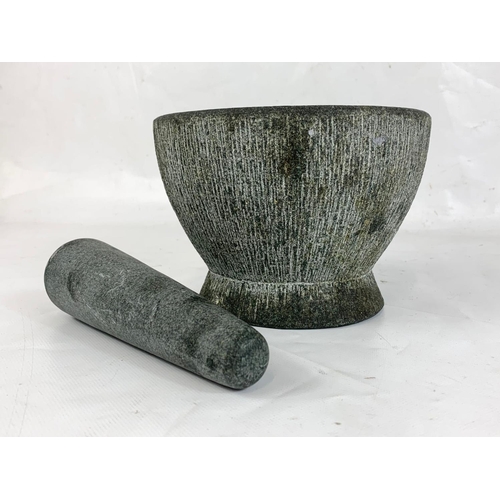 91 - A large stoneware Pestle & Mortar. 18 x 12.5cm