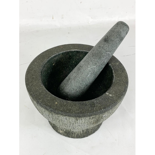 91 - A large stoneware Pestle & Mortar. 18 x 12.5cm