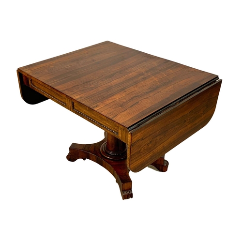 916 - A William IV rosewood Sofa Table with 2 drawers. Early 19th century. Circa 1830's. 98 x 75.5 x 72.5c... 