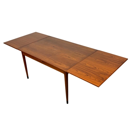 923 - A Danish teak table and 6 chairs designed by Niels Otto Moller for J. L. Mollers. Model 9 table, mod... 