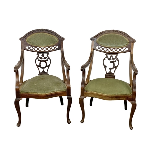 931 - A pair of Edwardian mahogany parlour armchairs. 57 x 53 x 91.5cm