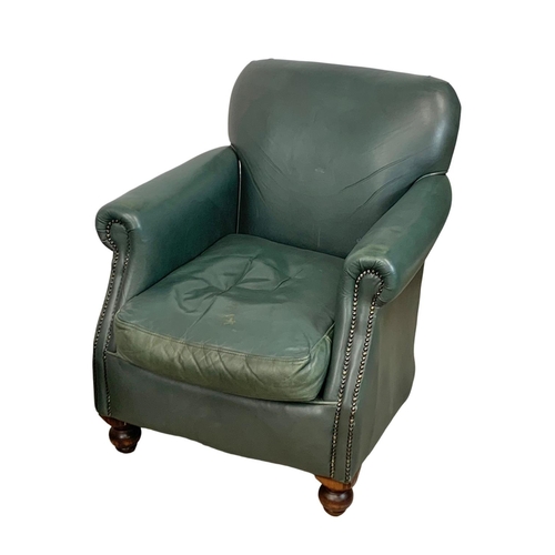 932 - A 2 piece Thomas Lloyd leather suite. 2 seater sofa and an armchair. Sofa measures 120cm