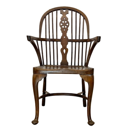 933 - An early 20th century elm and beech Windsor armchair. 61 x 50 x 106cm