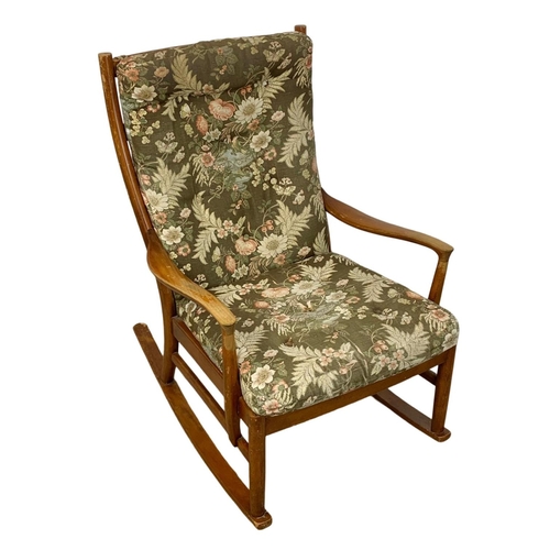 934 - A vintage Parker Knoll beech rocking chair. Model 1016-19.