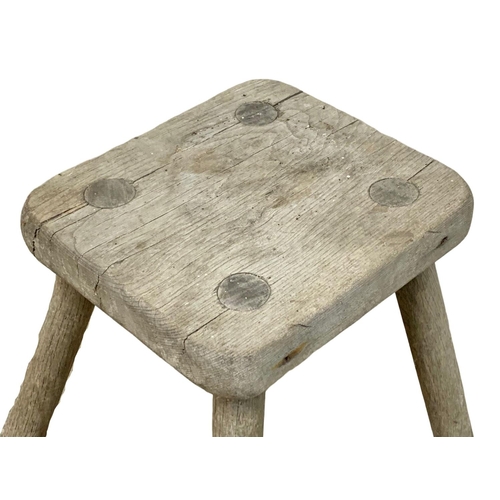 941 - A primitive stool.