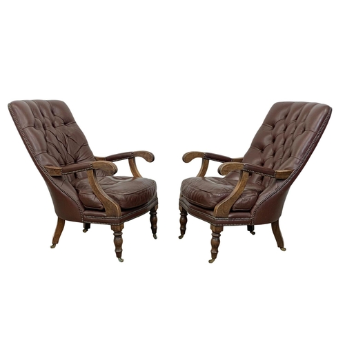 960 - A pair of vintage William IV style deep button leather armchairs. 59 x 107 x 93cm