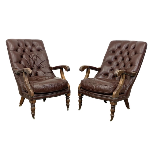 960 - A pair of vintage William IV style deep button leather armchairs. 59 x 107 x 93cm