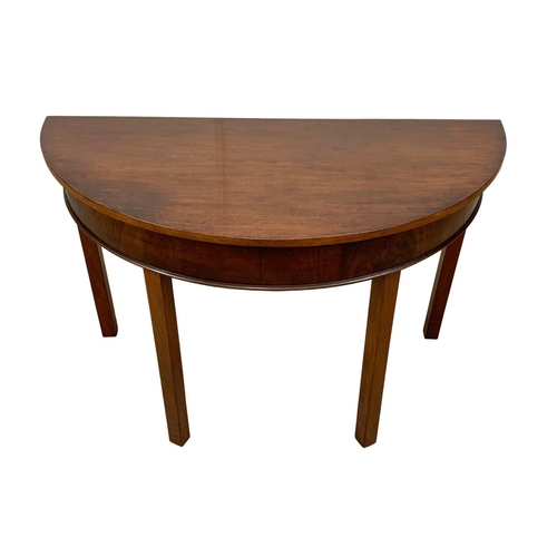 961 - A pair of Georgian style mahogany D-End tables. Circa 1900. 113 x 53 x 73.5cm.