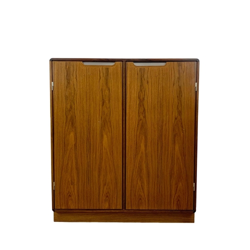 972 - A Danish rosewood collectors cabinet designed by Posborg & Meyhoff for Sibast Mobler. 92 x 42 x 105.... 