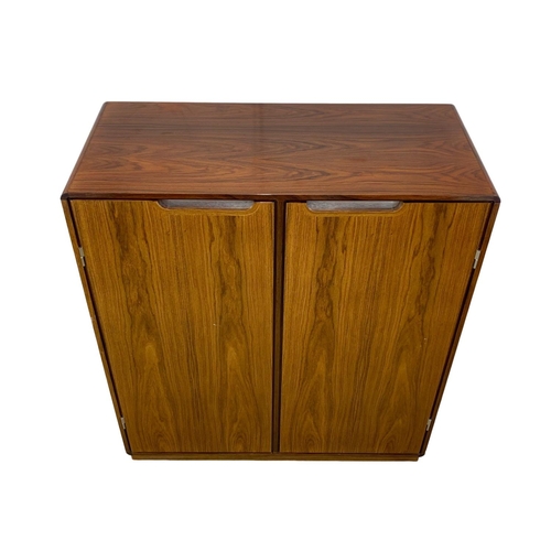 972 - A Danish rosewood collectors cabinet designed by Posborg & Meyhoff for Sibast Mobler. 92 x 42 x 105.... 