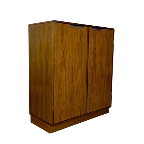 972 - A Danish rosewood collectors cabinet designed by Posborg & Meyhoff for Sibast Mobler. 92 x 42 x 105.... 