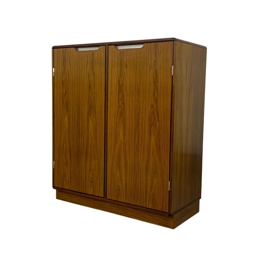 972 - A Danish rosewood collectors cabinet designed by Posborg & Meyhoff for Sibast Mobler. 92 x 42 x 105.... 