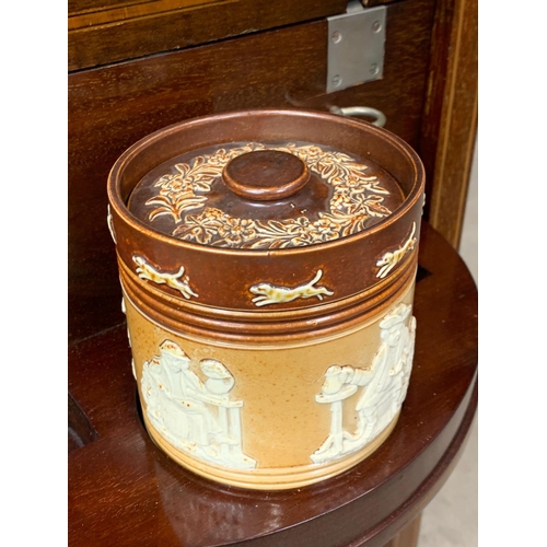 973 - An Edwardian inlaid mahogany smokers cabinet with a Royal Doulton Lambeth humidor. 38 x 43 x 76cm