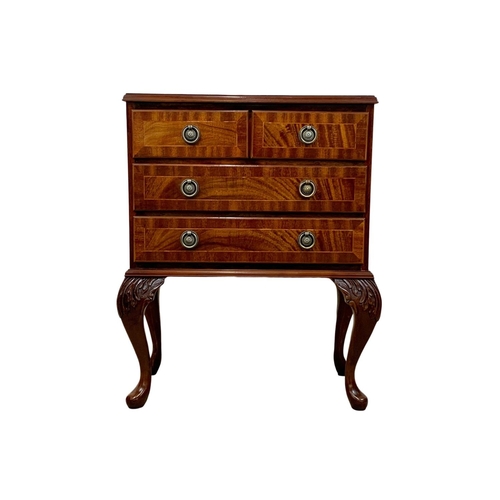 981 - A small Georgian style inlaid mahogany chest of drawers. 54 x 30 x 69cm