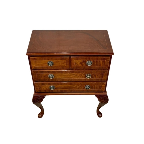 981 - A small Georgian style inlaid mahogany chest of drawers. 54 x 30 x 69cm