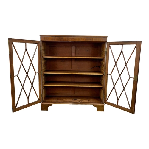 982 - A large Victorian mahogany double glazed door bookcase. 112 x 40.5 x 122.5cm