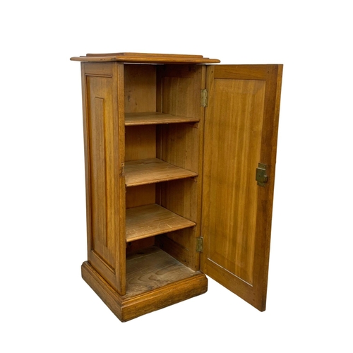 998 - A tall Victorian oak bedside. 42 x 40 x 96cm.