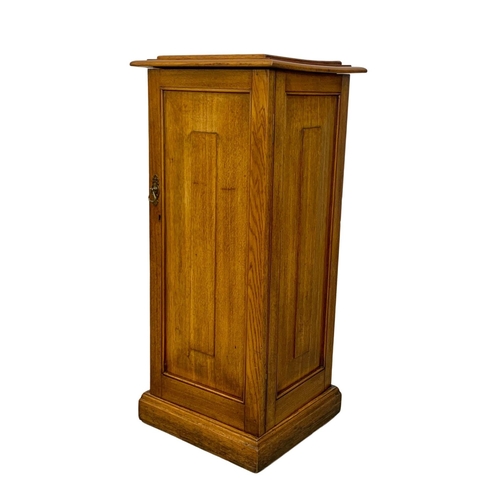 998 - A tall Victorian oak bedside. 42 x 40 x 96cm.