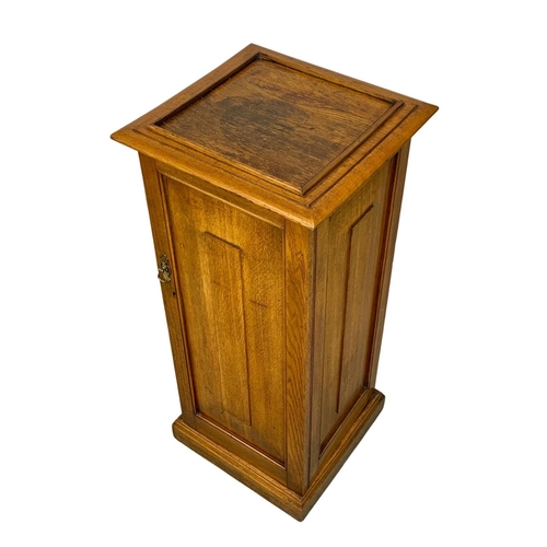 998 - A tall Victorian oak bedside. 42 x 40 x 96cm.