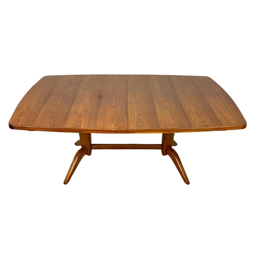 850 - A Mid Century Brazilian rosewood extending dining table by Gordon Russell. Circa 1960. Fully extende... 