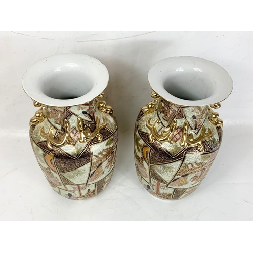 580 - A large pair of reproduction hand painted Satsuma vases, 36cm