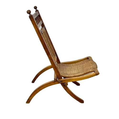 1009 - A small late 19th century campaign folding chair