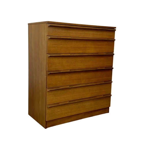 1015 - An Avalon teak Mid Century chest of drawers. 82 x 45 x 97cm.