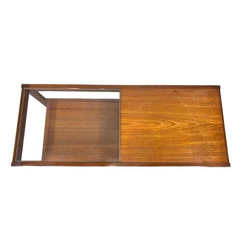 1017 - A teak 2 tier glass top Mid Century. coffee table. 119.5 x 48 x 41cm.