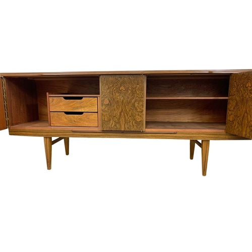 1018 - A Mid Century melamine cocktail sideboard by Beautility. 183.5 x 48 x 77.5cm