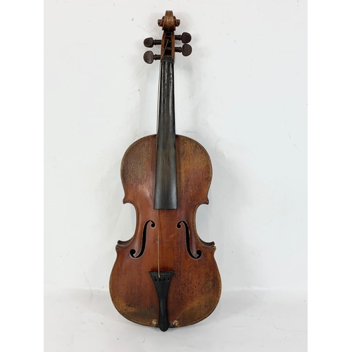 102 - A late 19th century violin in case. Case measures 80cm