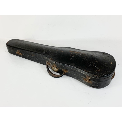 102 - A late 19th century violin in case. Case measures 80cm