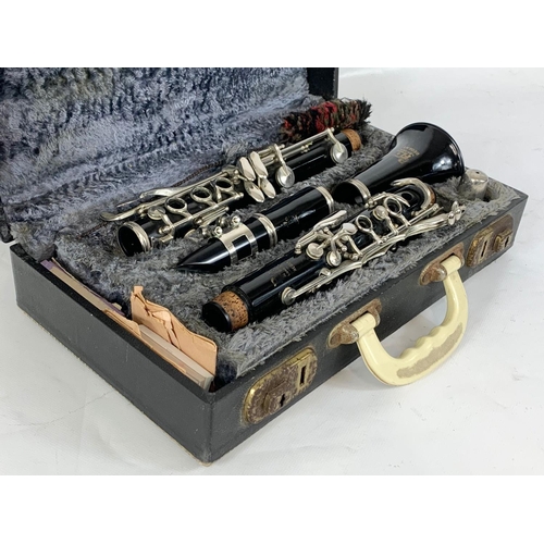 103 - A Boosey & Hawkes London clarinet in case.