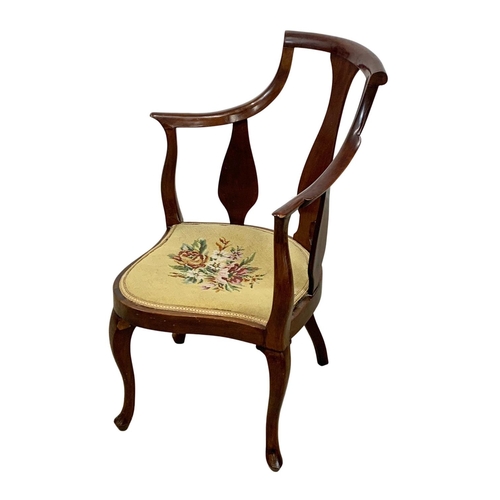 1036 - An Edwardian high back corner armchair.