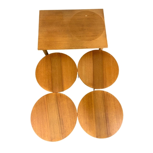 1041 - A Danish teak nest of tables designed by Poul Hundevad. 62 x 42 x 56.5cm