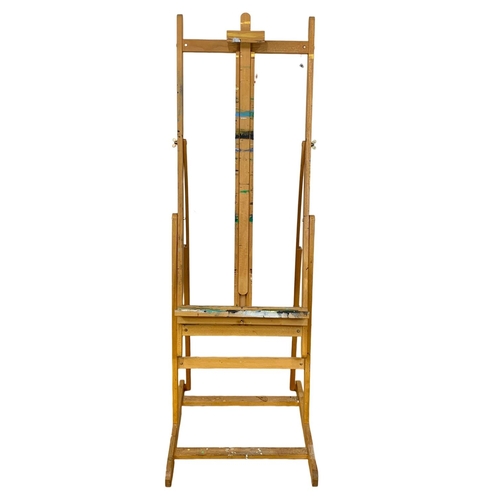 1043 - A large vintage wooden easel. 54 x 160cm