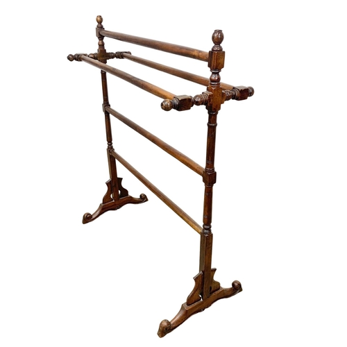 1044 - A Victorian style towel rail and a tall vintage mahogany torchiere plantstand. Towel rail measures 1... 