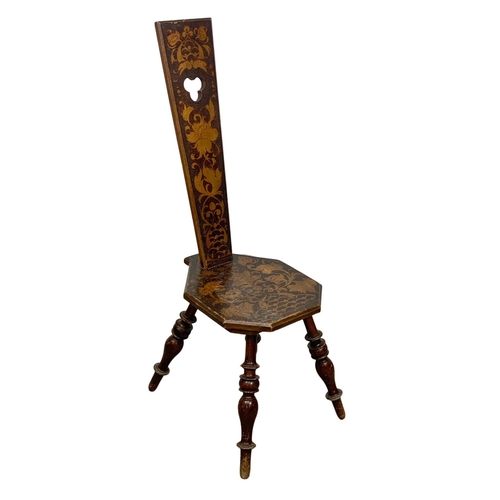 1059 - A late 19th century spinning wheel chair with Pokerwork decoration.