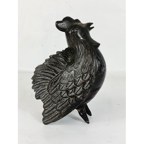 107 - An early 20th century Bronze ornament. 12 x 16cm.