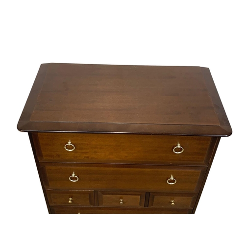 1100 - A Stag chest of drawers. 82 x 46.5 x 112cn