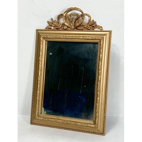 115 - 2 ornate gilt framed mirror. 29 x 45cm.