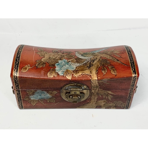 119 - A Chinese wooden incense box with chopsticks. 32 x 12.5 x 14.5cm