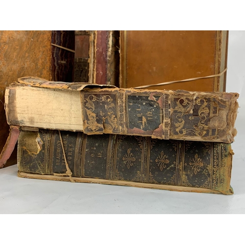 129 - A collection of early to late 19th century leather bound books.