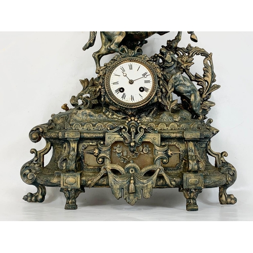 130 - A large late Victorian brass mantle clock. 42 x 52cm.