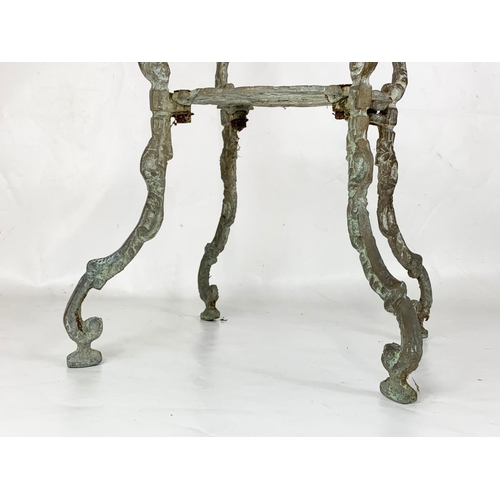 132 - A vintage brass and marble top plantstand. 72.5cm.